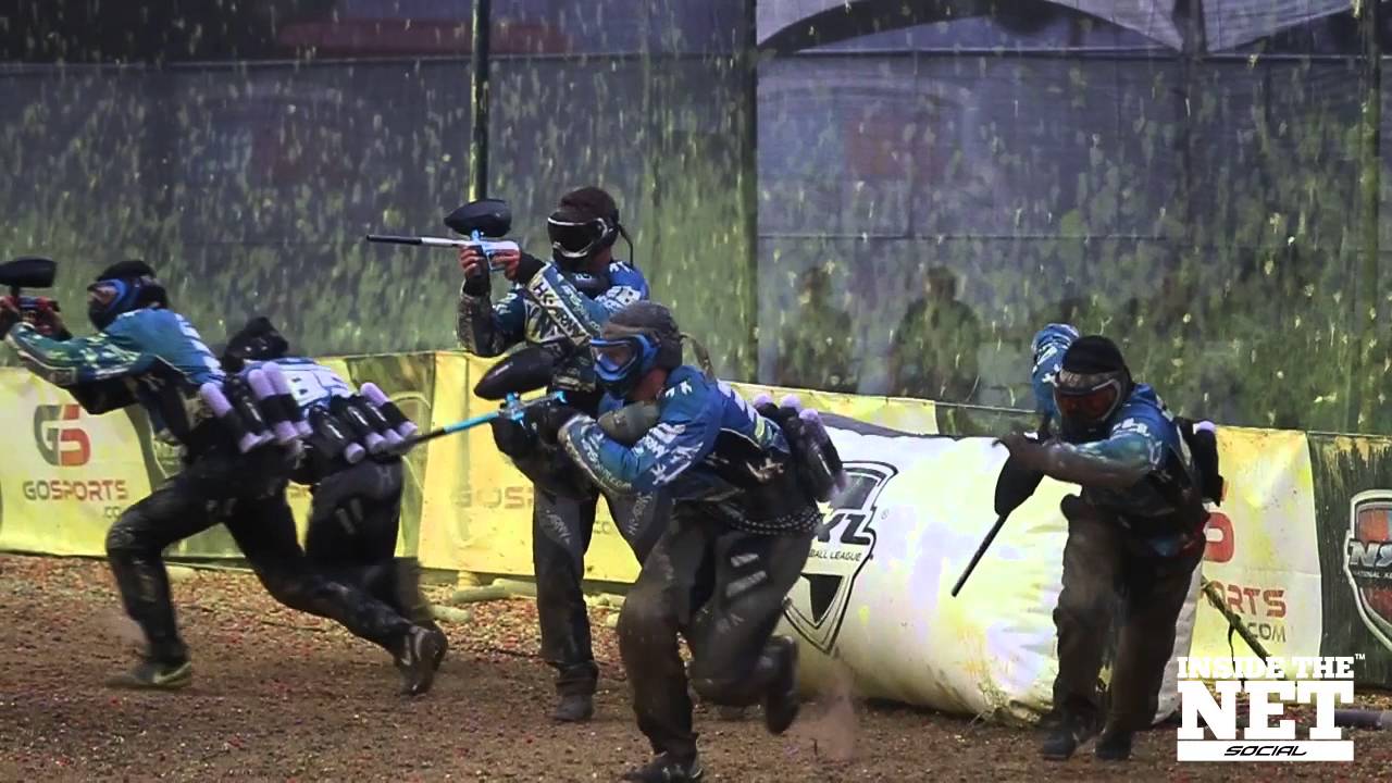 A professional paintball team starting a match.